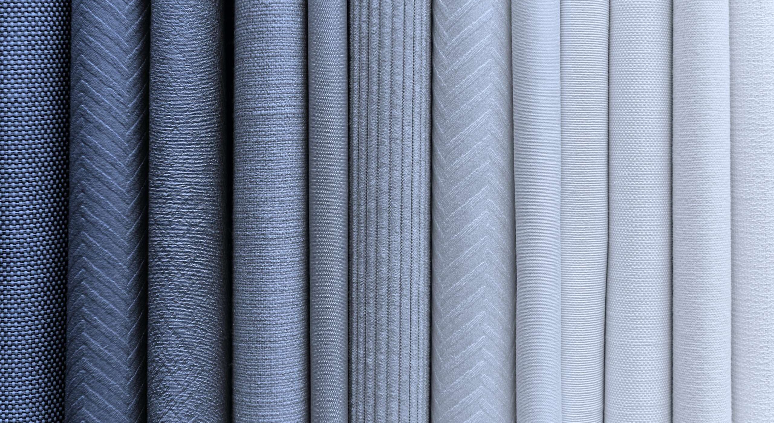 Blueish fabric stacks textured background